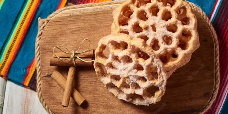 Ponche caliente y buñuelos en Navidad